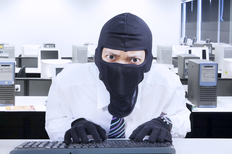 Businessman wearing mask stealing information 1